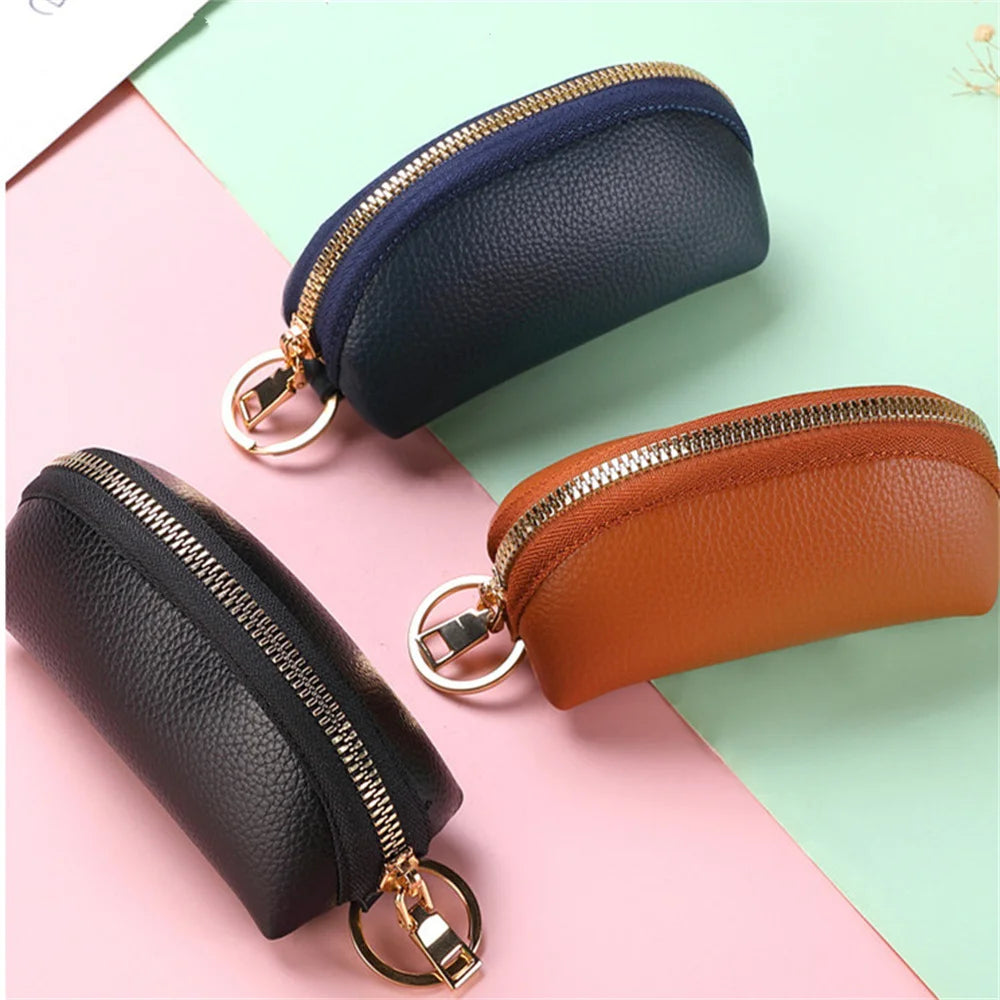 3 Leather Key Holders in Different Colors, Metal Hardware, Colored Background, Lifestyle Image